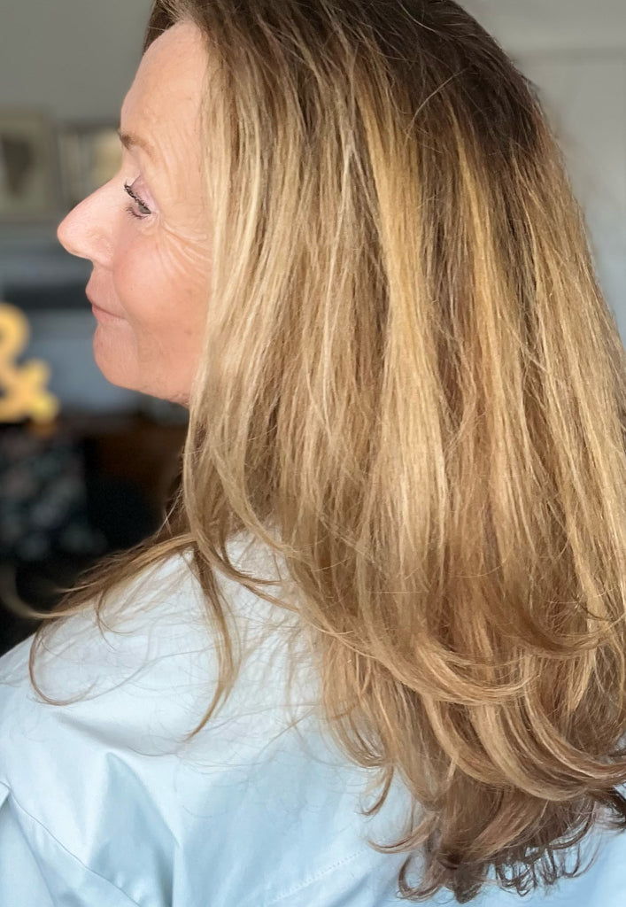 Side Profile of Dorte Andersen with Long Blonde Hair